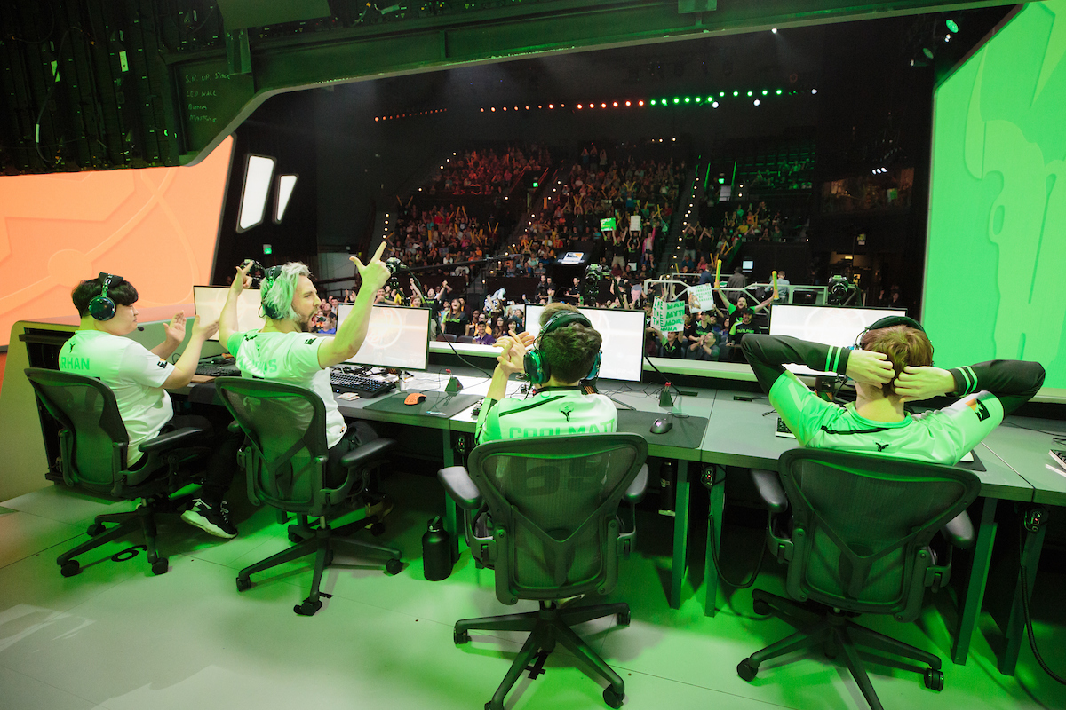 Houston Outlaws celebrating a win on-stage.