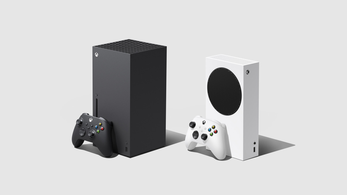 The Xbox Series X, a black rectangular box with a black controller resting against it, next to an Xbox Series S, a small, slimmer white box with a black circle on its front and a white controller resting on against it.
