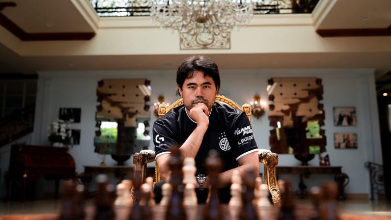 A photograph of Hikaru Nakamura playing chess.