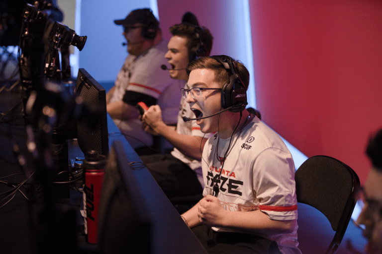 Atlanta FaZe cheer after winning a match at the Call of Duty League.