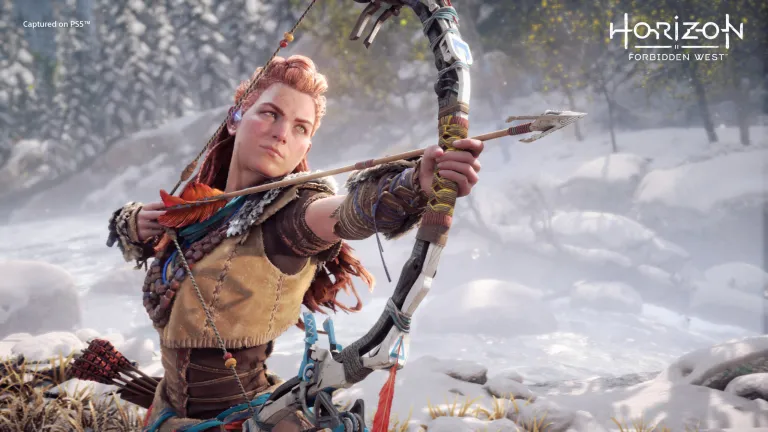 Aloy prepares to fire an arrow near a frozen lake in Horizon: Forbidden West.