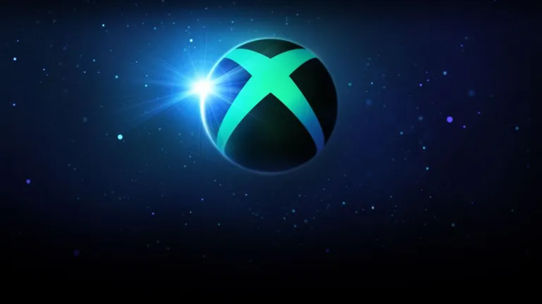 the xbox logo adrift in a spacious sea of dark blue