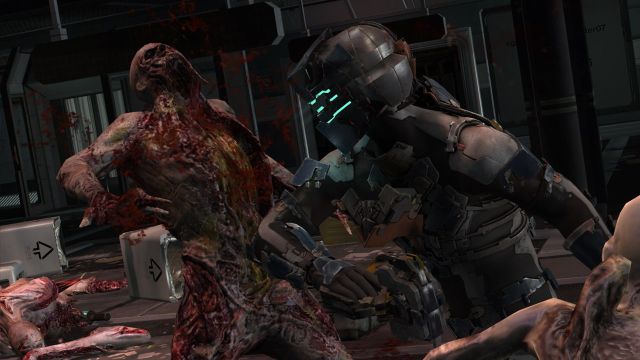 Image of Isaac Clark in Dead Space 2 punching a necromorph.