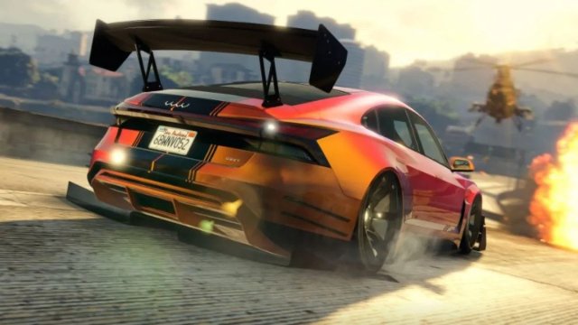 an orange super car in gta online kickign up some tire smoke