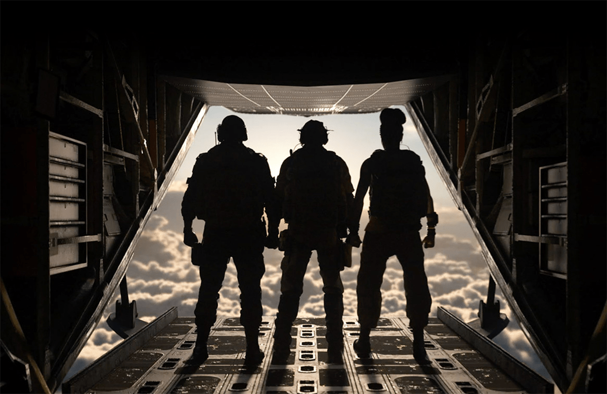 Three characters stand on the edge of a plane ramp ready to drop into CoD Warzone.