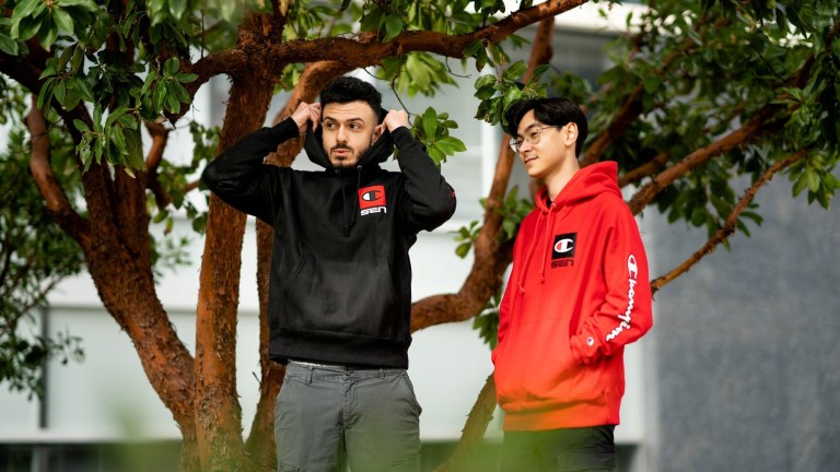 Tarik and TenZ posing in Sentinels merch.