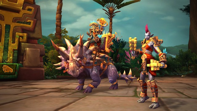 Zandalari Trolls wearing their Heritage Armor and showing off their mount