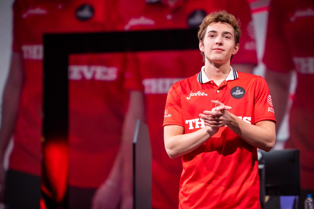 Busio claps his hands after a 100 Thieves victory in the LCS studio.