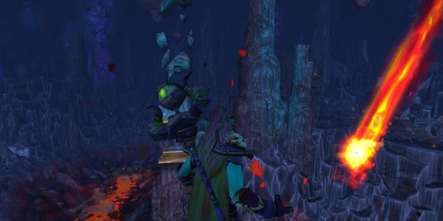 Troll Warlock facing away from the camera in Deepholm World of Warcraft casting a fire spell.