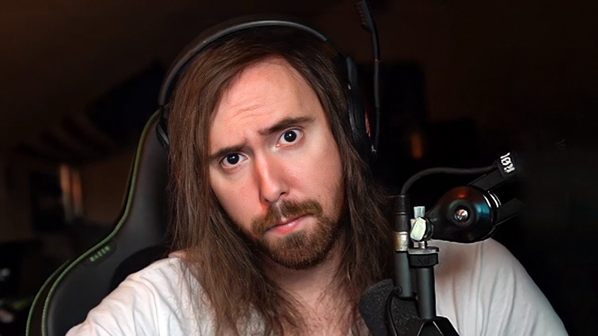 A screenshot of Asmongold looking at the camera. He has long, majestic hair like a Disney princess.