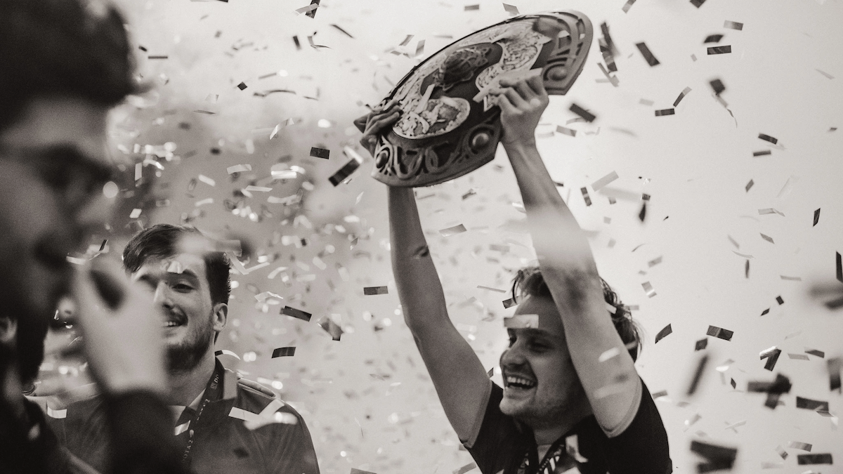 Jerax lifting the Aegis of Champions at Dota 2's The International.