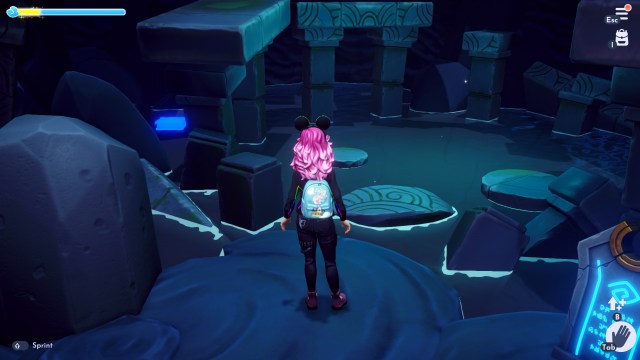 The player looking at the Blue Book hidden behind a pillar.