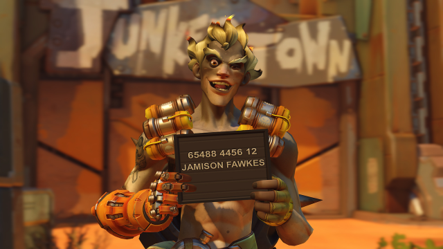 Junkrat from Overwatch 2 holding up a mug shot identification card. 