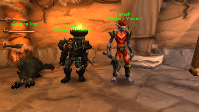 Two weapon masters standing next to one another in Orgrimmar.