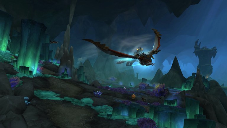 Dragon flying through a cave in WoW Dragonflight