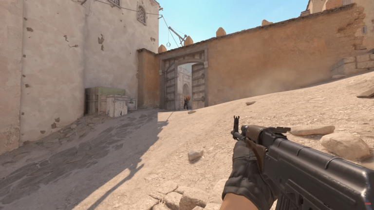 An enemy taken down on Dust2 in Counter-Strike 2.