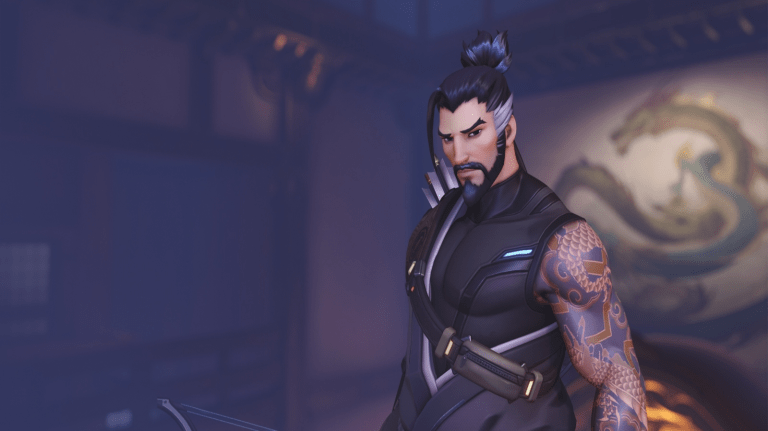 Hanzo from Overwatch 2 standing and looking directly at the players