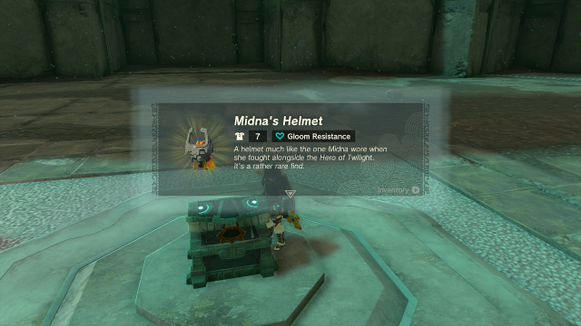 Link opens a treasure chest and a dialogue box pops up, showing Midna's Helmet.