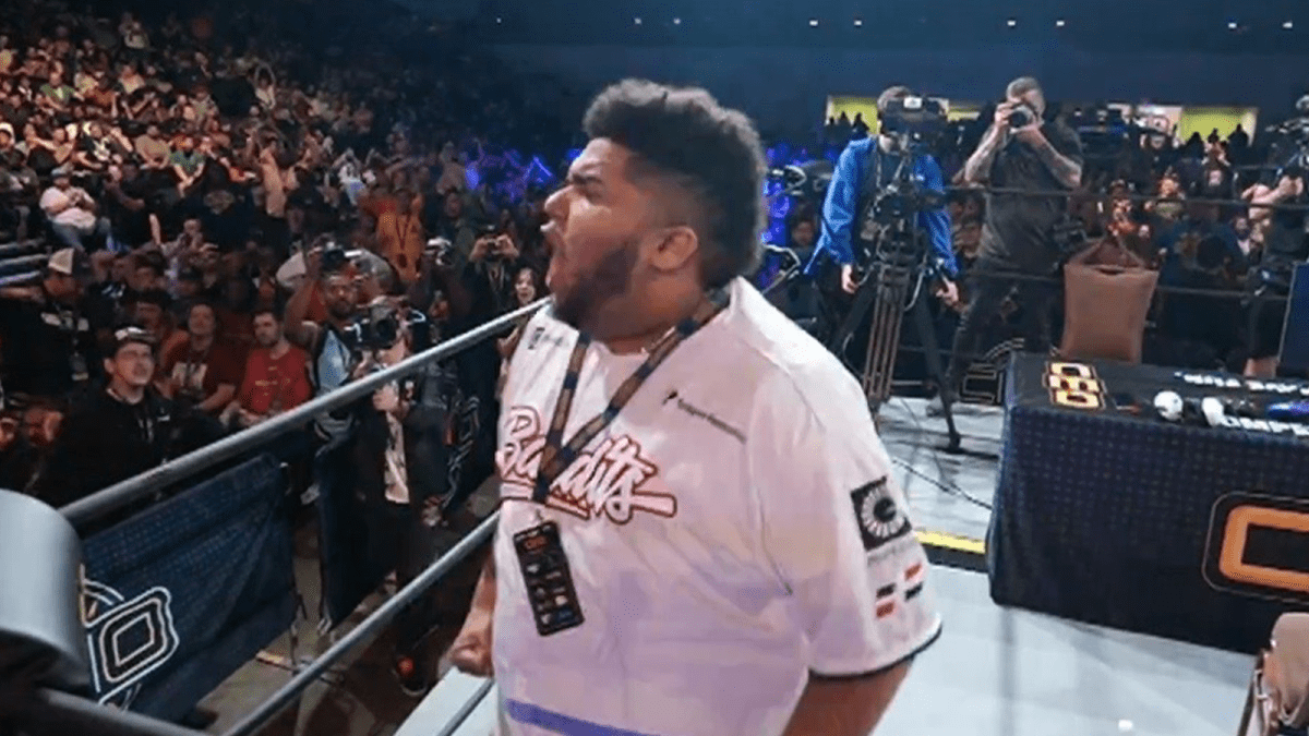 MenaRD celebrating his Street Fighter 6 win at CEO 2023 in Florida.