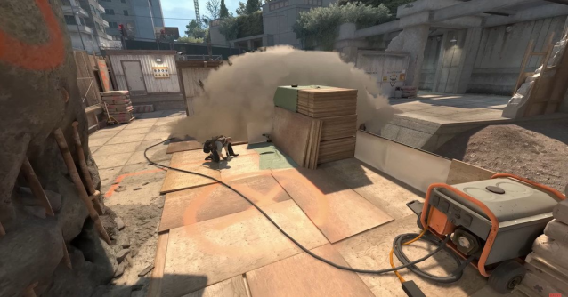 Overpass CS2 T planting the bomb on the B site