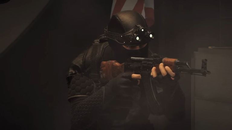 An Echelon spy in XDefiant wielding an AK47 in the darkness.