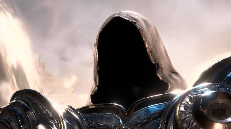 Diablo 4's Inarius stares menacingly behind his cloak in front of a bright light.