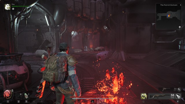 A character in Remnant 2 stands next to a glowing red checkpoint.