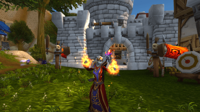 A Lightforged Draenei casting Fireball in Stormwind. World of Warcraft.
