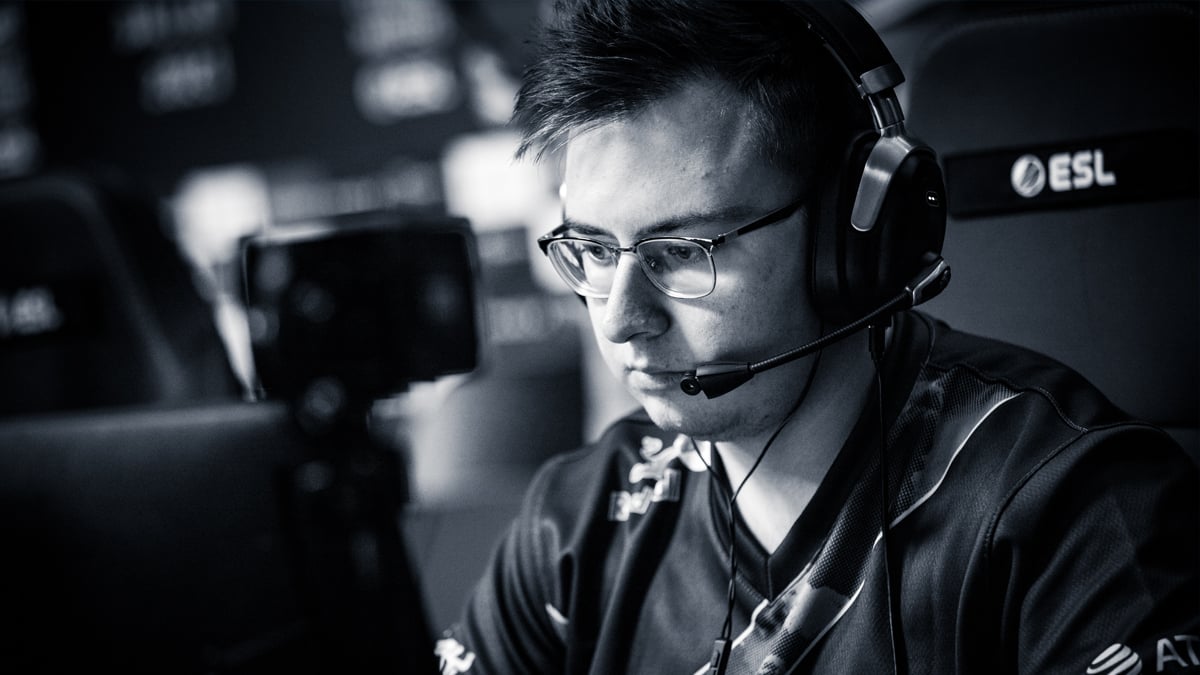 The CS:GO player Ax1Le, from Cloud9, sitting at a computer and playing CS:GO live at IEM Dallas.