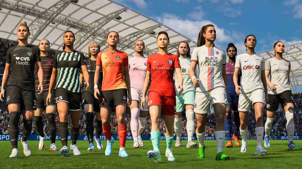 A group of female footballers walking on the pitch in EA Sports FC