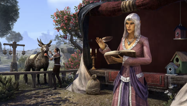 A High Elf with white hair holds a quill pen and an open book. An Indirik, a deer-like mount, stands behind her.