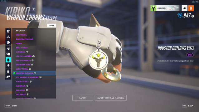 A Houston Outlaws weapon charm equipped on Kiriko's hand in Overwatch 2.