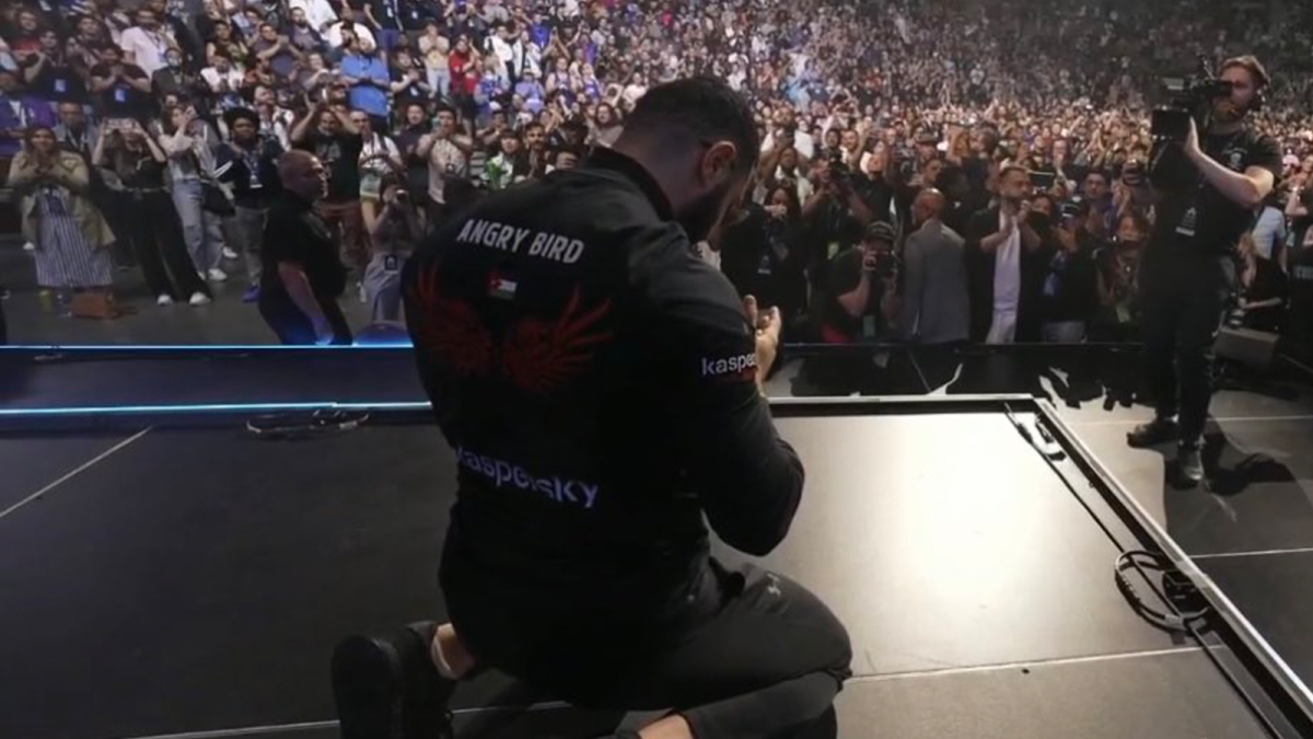 AngryBird praying after winning Evo 2023.