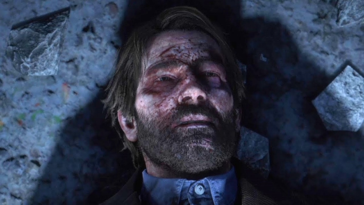 An image of Arthur Morgan dying on the ground in Red Dead Redemption 2.