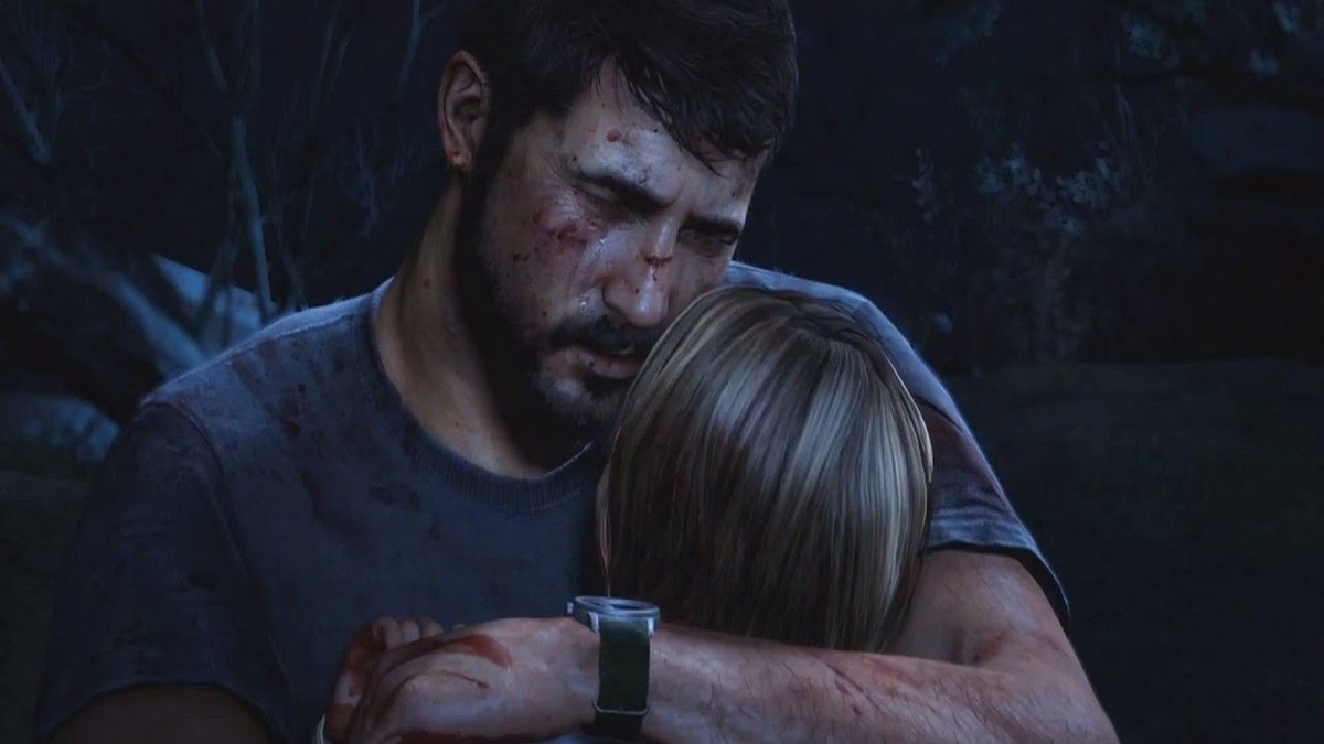 An image of Joel mourning the death of his daughter Sarah in The Last of Us.