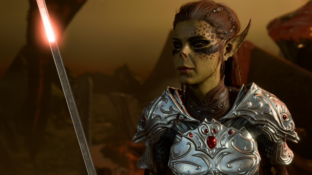 Lae'zel, a female orc, holding a sword in Baldur's Gate 3.