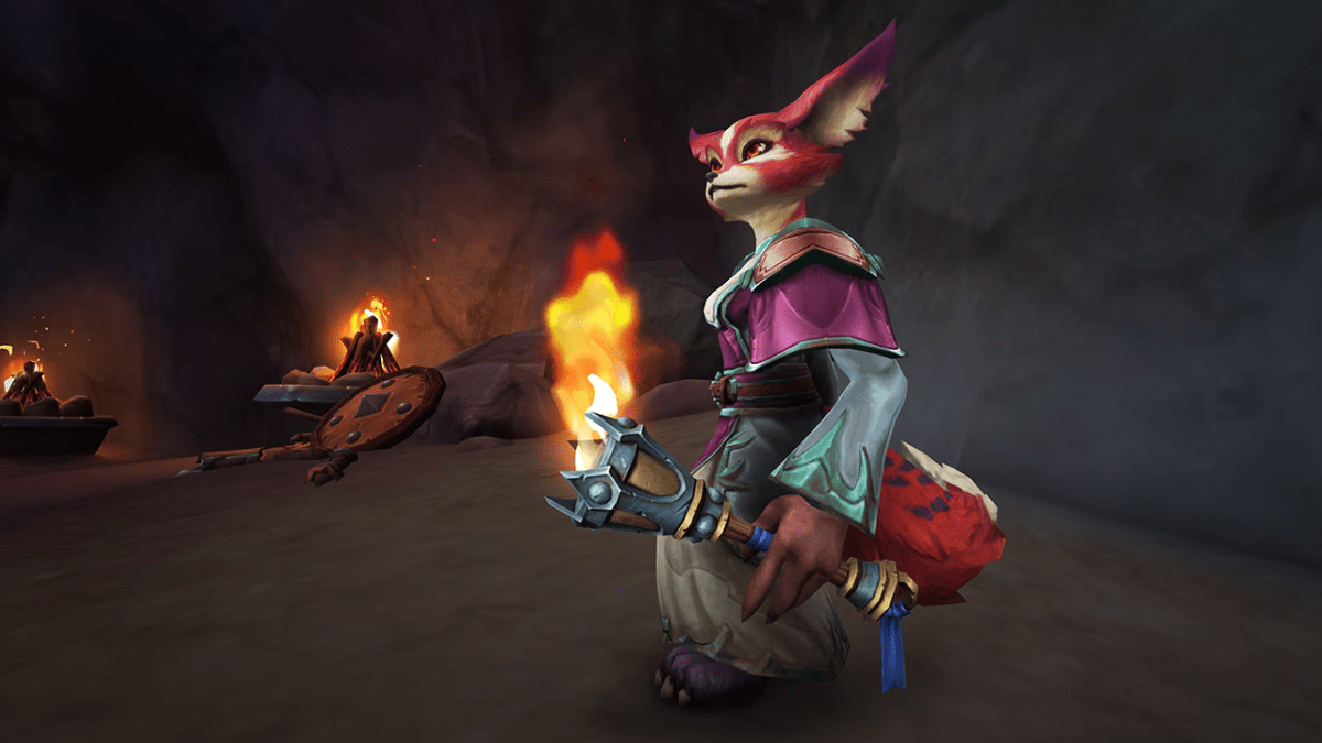 Vulpera holding the Torch of Pyrreth toy