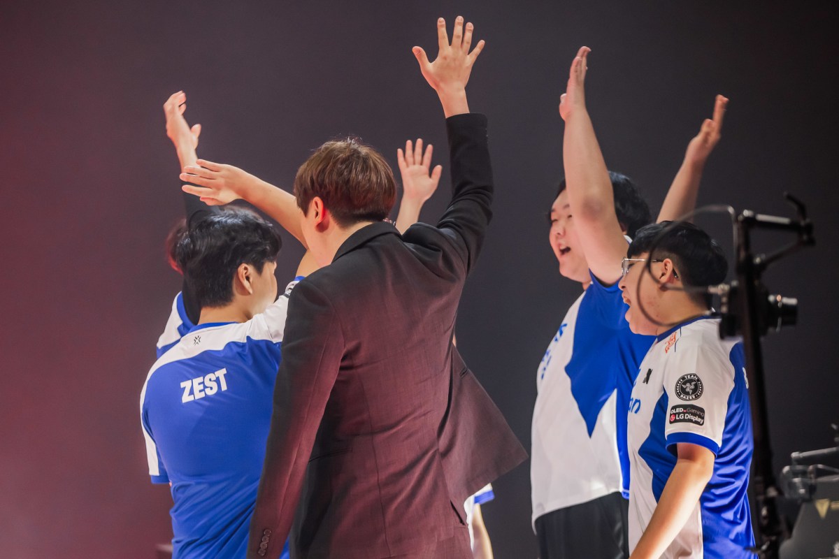 DRX raise their hands in a cheer before their match against NAVI on August 6, 2023.