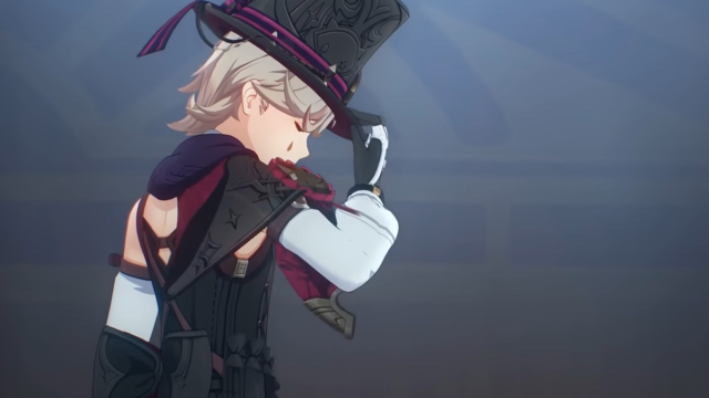 Screenshot of Genshin 4.0 trailer showing Lyney bowing while holding his hat.