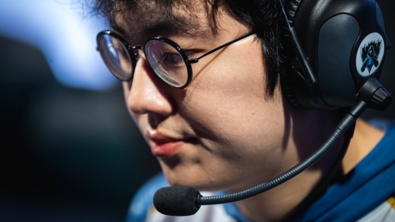 A close-up of Olleh wearing glasses and headphones.