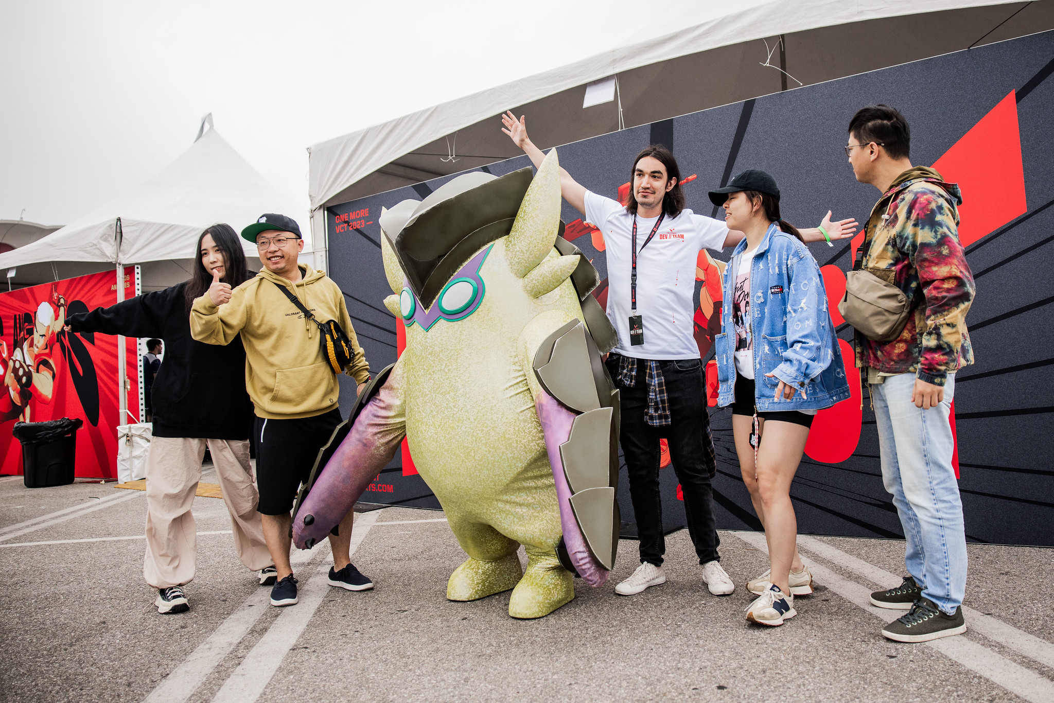 Fans posing with Wingman at VALORANT Champions Fan Fest.