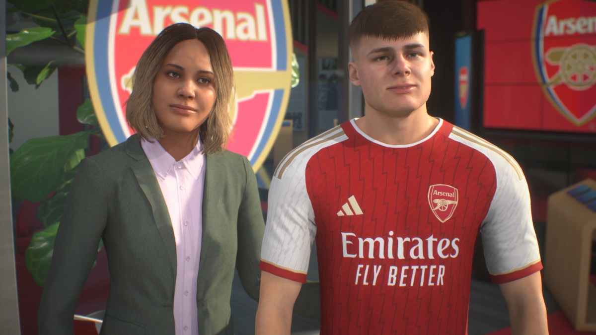 Evan Ferguson in EA FC 24 standing alongside a custom manager after signing for Arsenal.