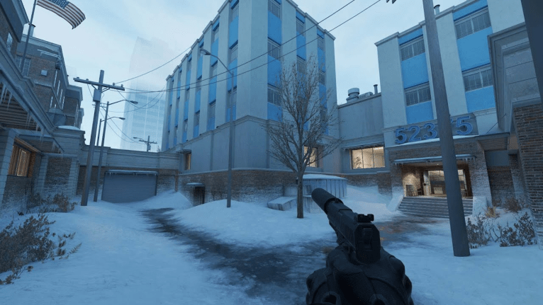 USP-S pistol in the snow outside an office building in Counter-Strike 2