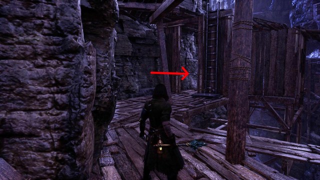 An arrow pointing to a shack next to a ladder in Lies of P
