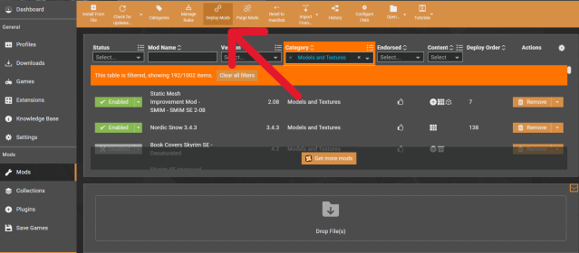 Displays the Mods menu tab within Vortex Mods, with an arrow pointing to the Deploy Mods option.