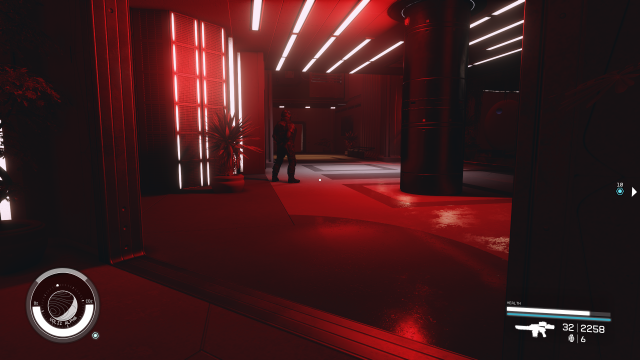 A Ryujin guard in a bright red room