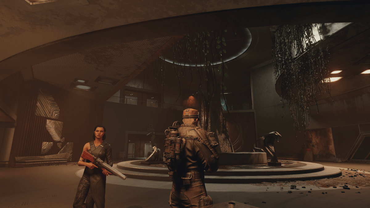 Our character and Andreja standing in front of an abandoned lobby