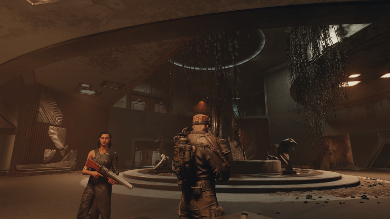 Our character and Andreja standing in front of an abandoned lobby