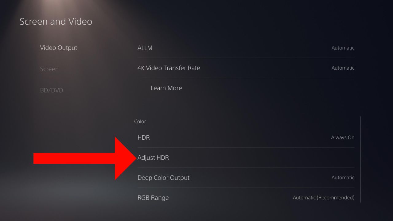 A red arrow pointing to the HDR adjust option on PlayStation