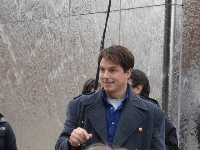 An image of John Barrowman in costume as Captain Jack Harkness from Doctor Who. 